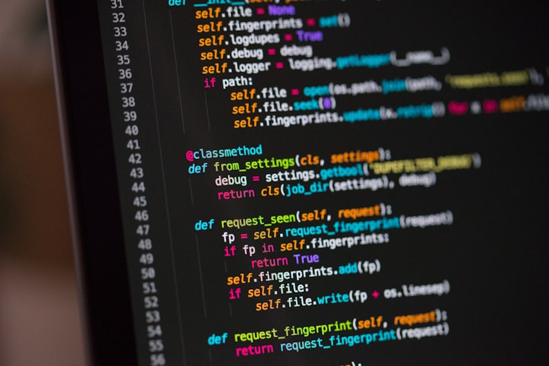 Lines of open-source code glowing on a dark monitor
